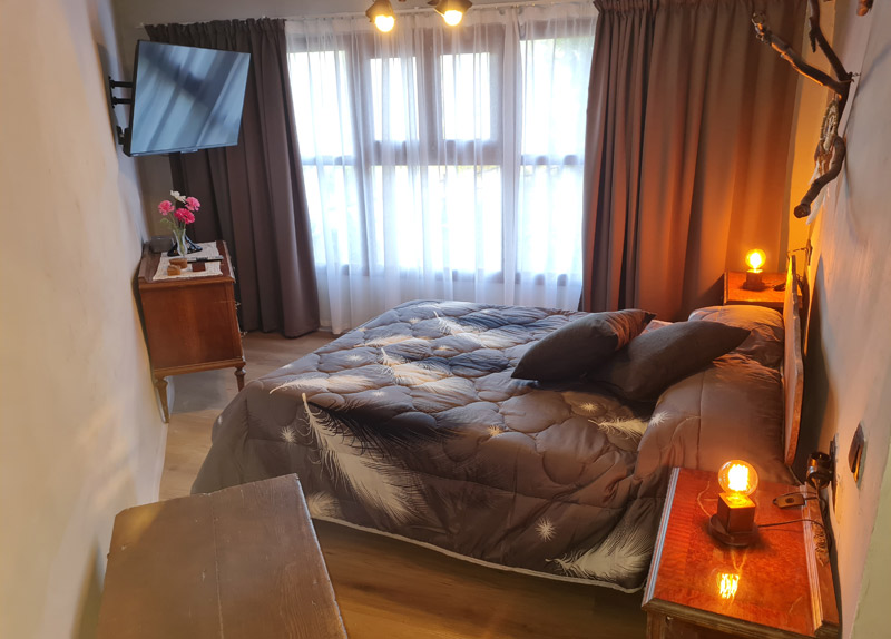 Apartamento rural con encanto en Borredà - dormitorio de estilo rústico
