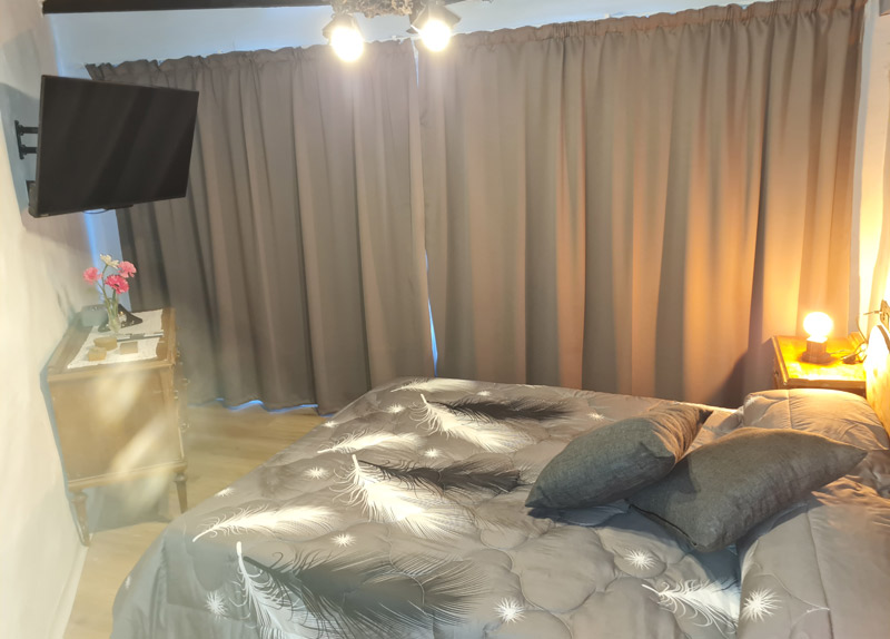 Apartamento rural con encanto en Borredà - dormitorio de estilo rústico