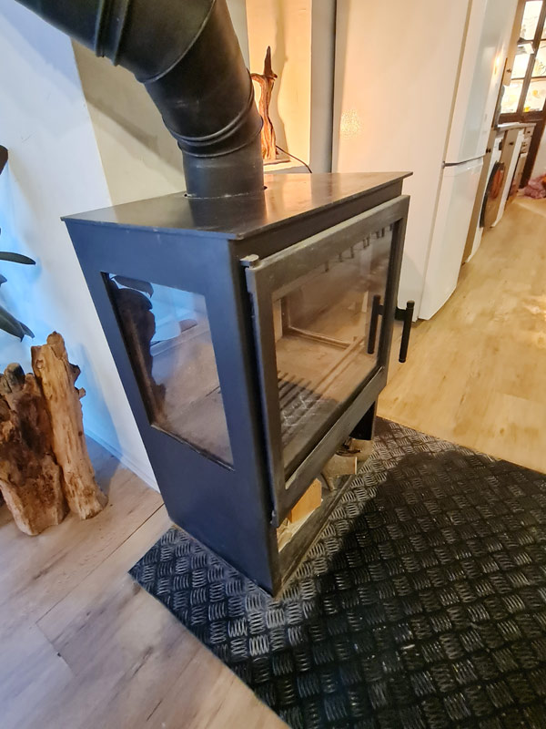 Tríplex Cal Barraqué de Dalt en Borredà - chimenea de leña