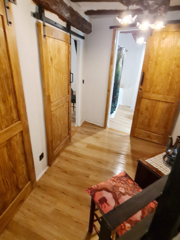 Tríplex Cal Barraqué de Dalt en Borredà - acceso a la sala de estar de la primera planta